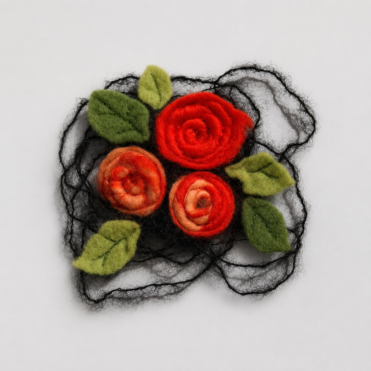 Broche en couture créative rouge